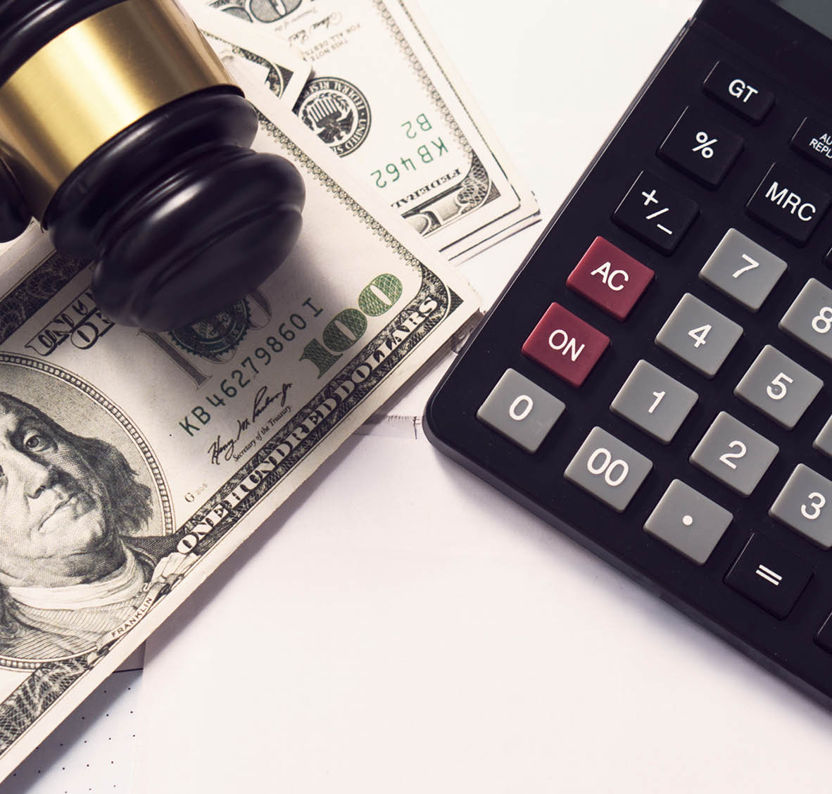 Tax concept.Calculator with taxes text with money on 1040 tax form.The new year tax concept.Income tax return.